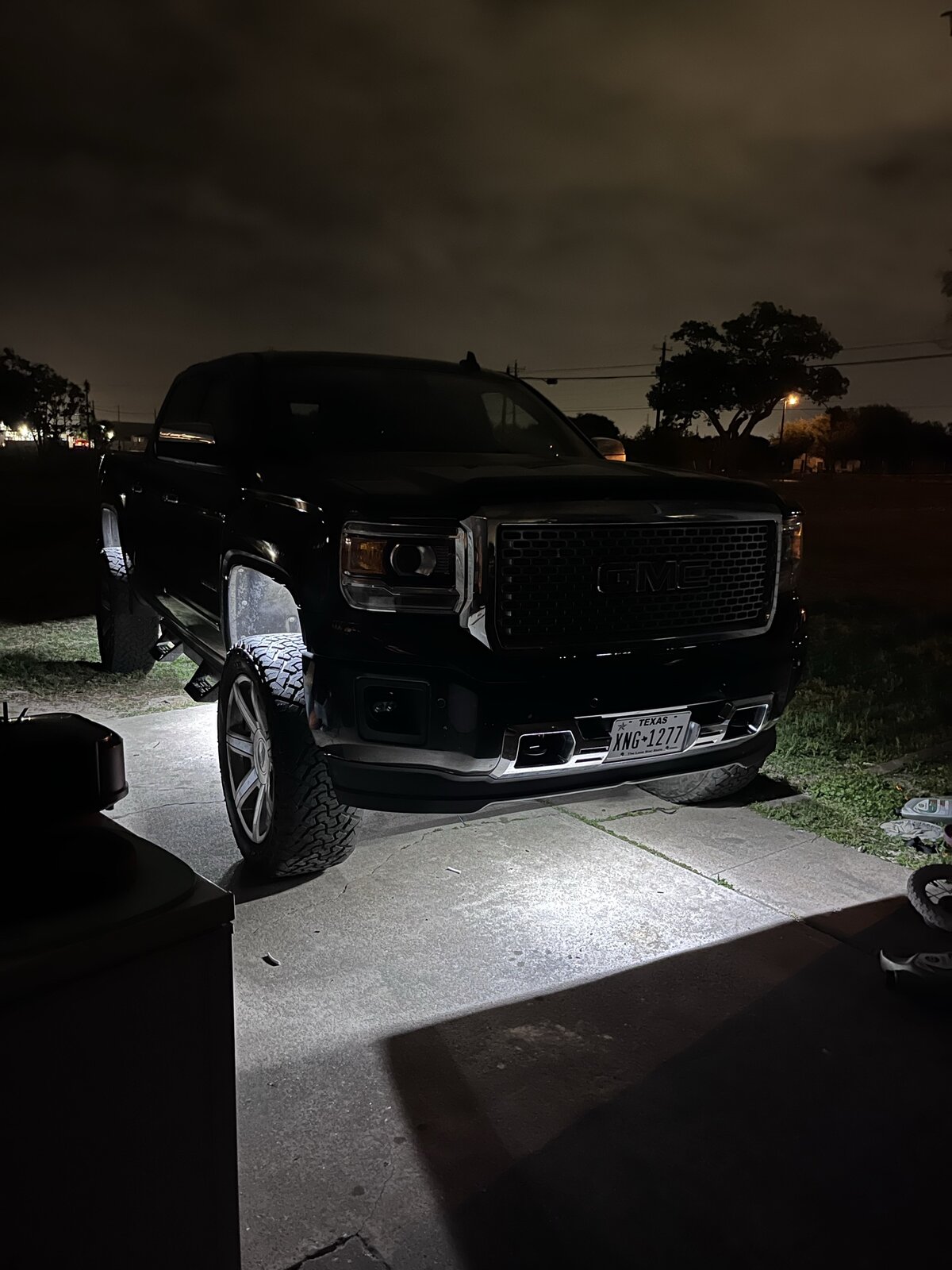 GMC Denali front view at night